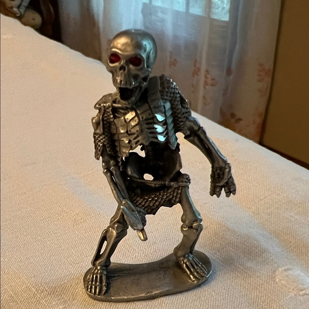 Pewter Skeleton Figurine with Sword.